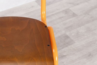 orange luxor chair close up of seat